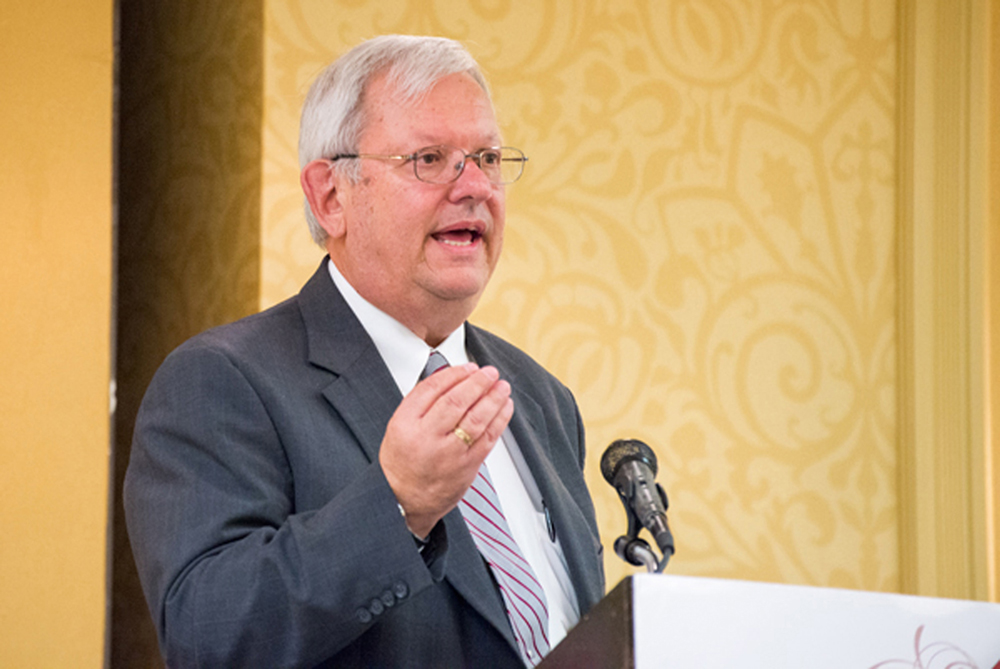 Interim Provost and Vice President for Research Joe Benson speaks to the large crowd at the CCBP Awards Program. Benson received the Distinguished Special Achievement in Engagement Scholarship award.