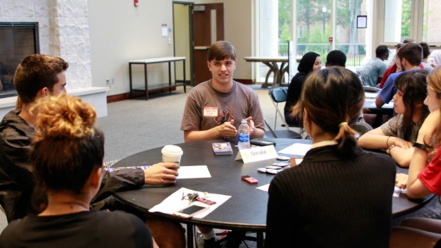 Stephen Cooper represents the Crimson Secular Student Alliance during the interfaith gathering.