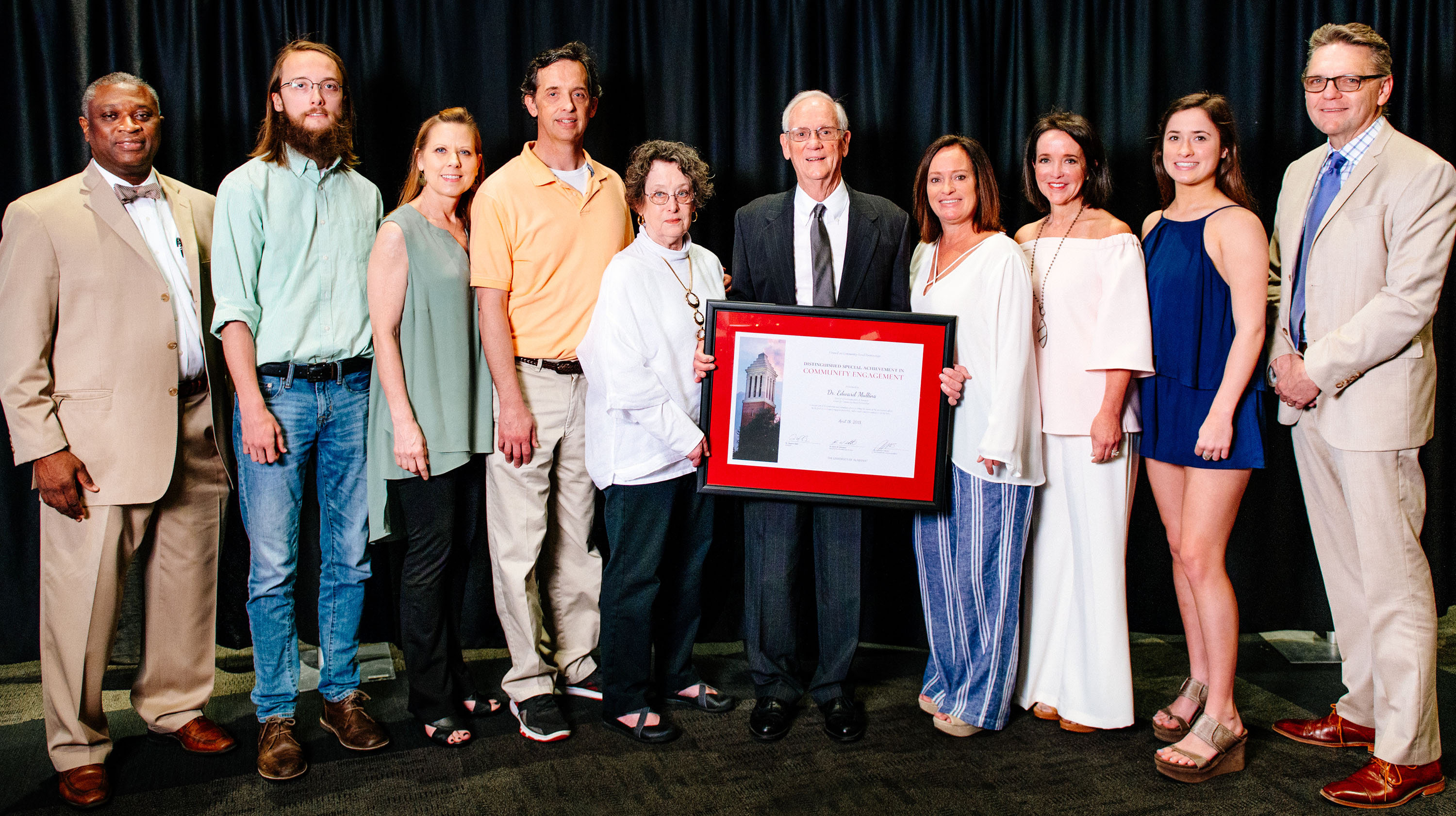 Ed Mullins stands with his family and Vice President Samory T. Pruitt and Dean Peter Hlebowitsh after receiving the 2018 award for Outstanding Special Achievement in Community-Engaged Scholarship.