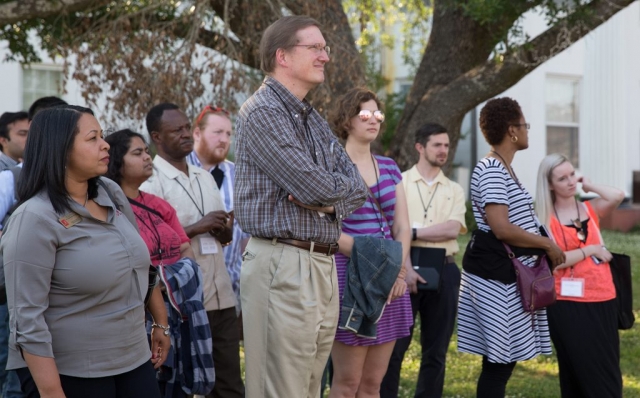 Tour participants listen as history of “Bloody Sunday” is told.