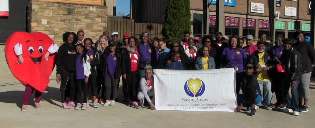 Saving Lives church members and the CCPB team pose for a group shot at the 2018 Heart Walk event.