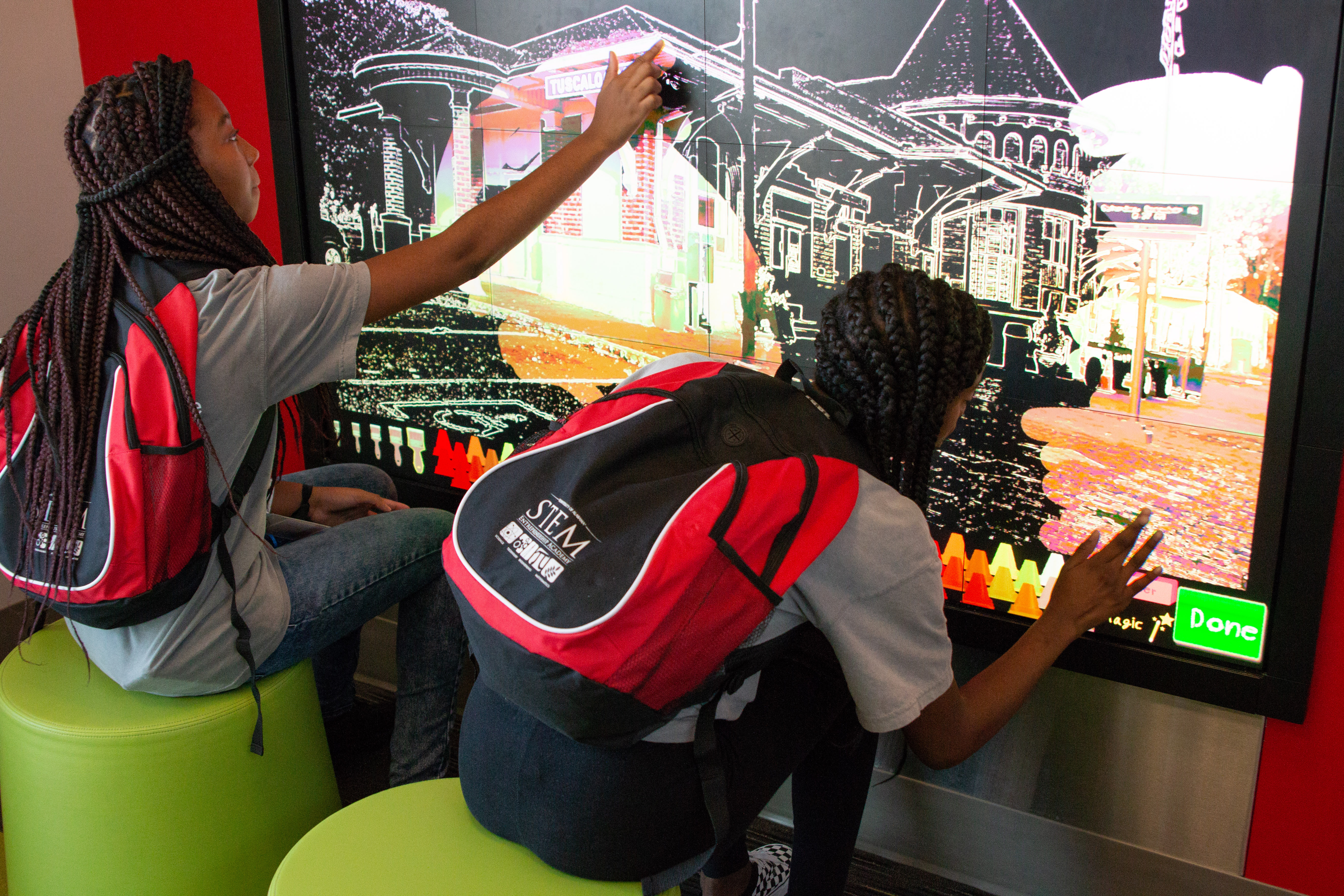 The Coloring Wall, located in the Children’s Exploration Room, is a hit with children of all ages, including those who spent time at The Gateway to Discovery during their STEM Academy week.