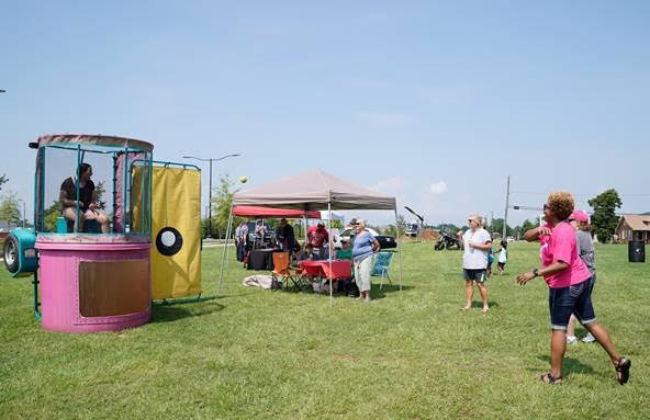 Event-goers enjoy lawn activities, fun and games during the Alberta Community Extravaganza.