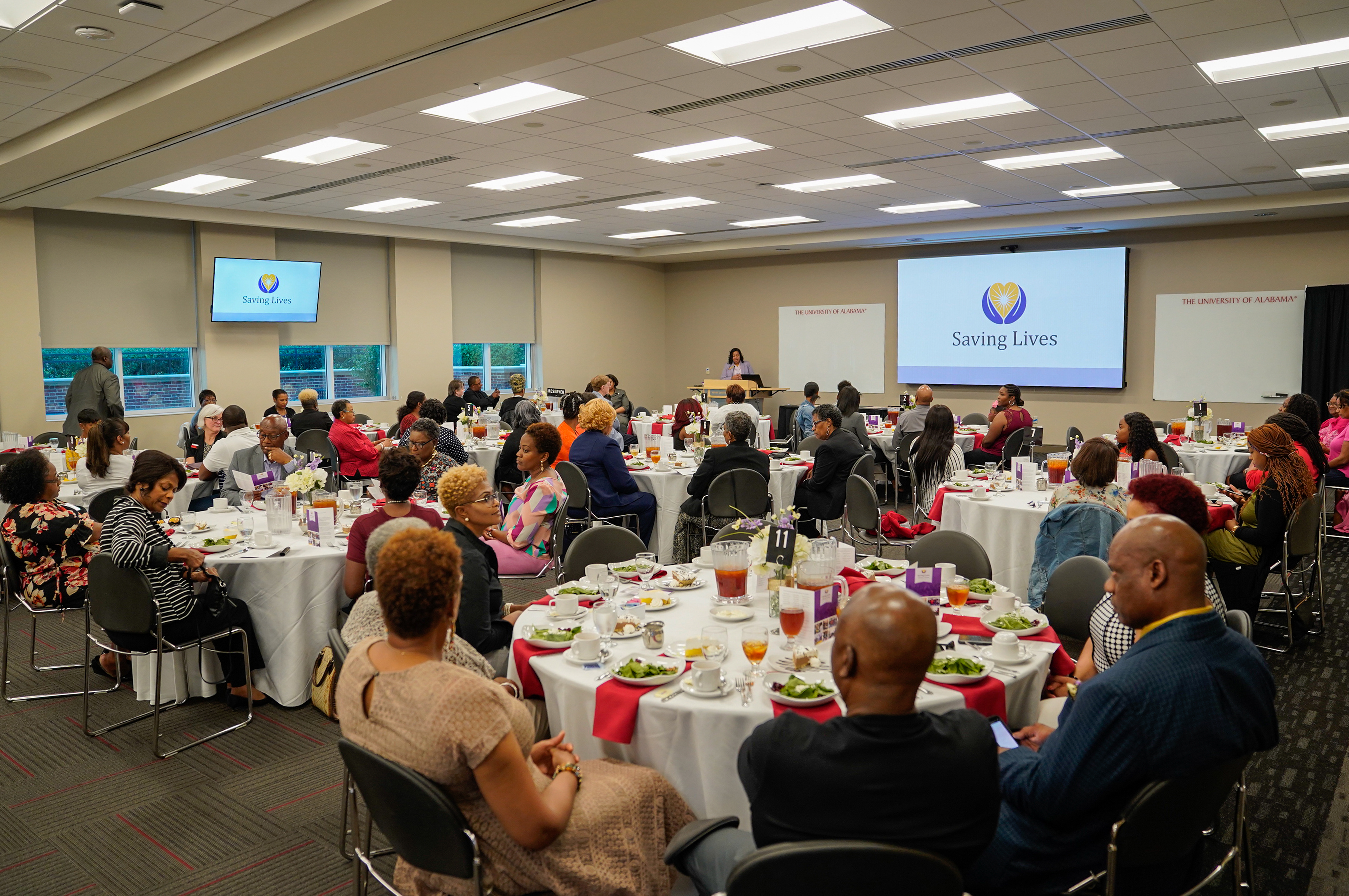 Faith communities enjoy dinner and networking during the Saving Lives event.