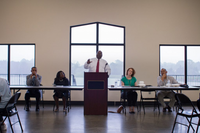 Chris Spencer, director of Resource Development for Community Engagement at UA’s Center for Community-Based Partnerships, speaks to those gathered at the Livingston Civic Center on Day 1 of the 2019 New Faculty Community Engagement Tour.