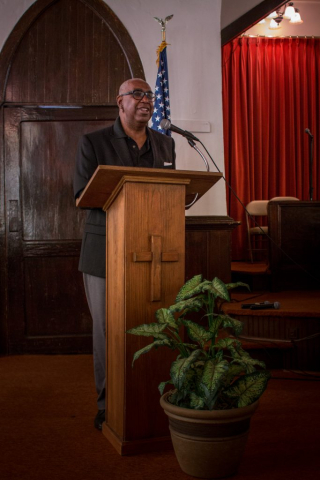 Llevelyn Rhone, founder of Greensboro Regional Opportunity Works, Inc., and site coordinator for Greensboro, welcomes tour participants at the Salem Missionary Baptist Church.