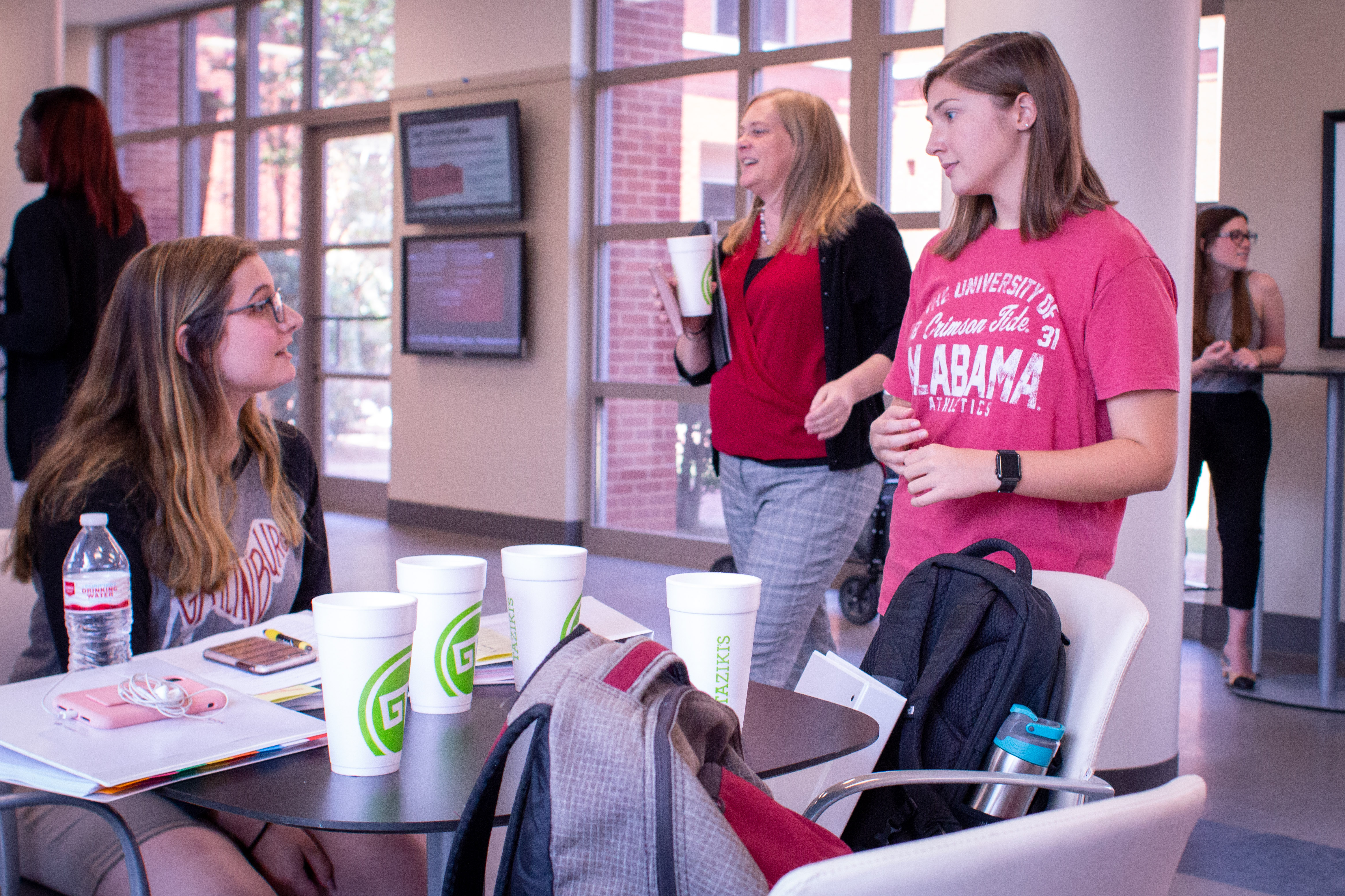 UA Honors Students engage in discussion about financial resources and housing stability at the HomeFirst retreat.