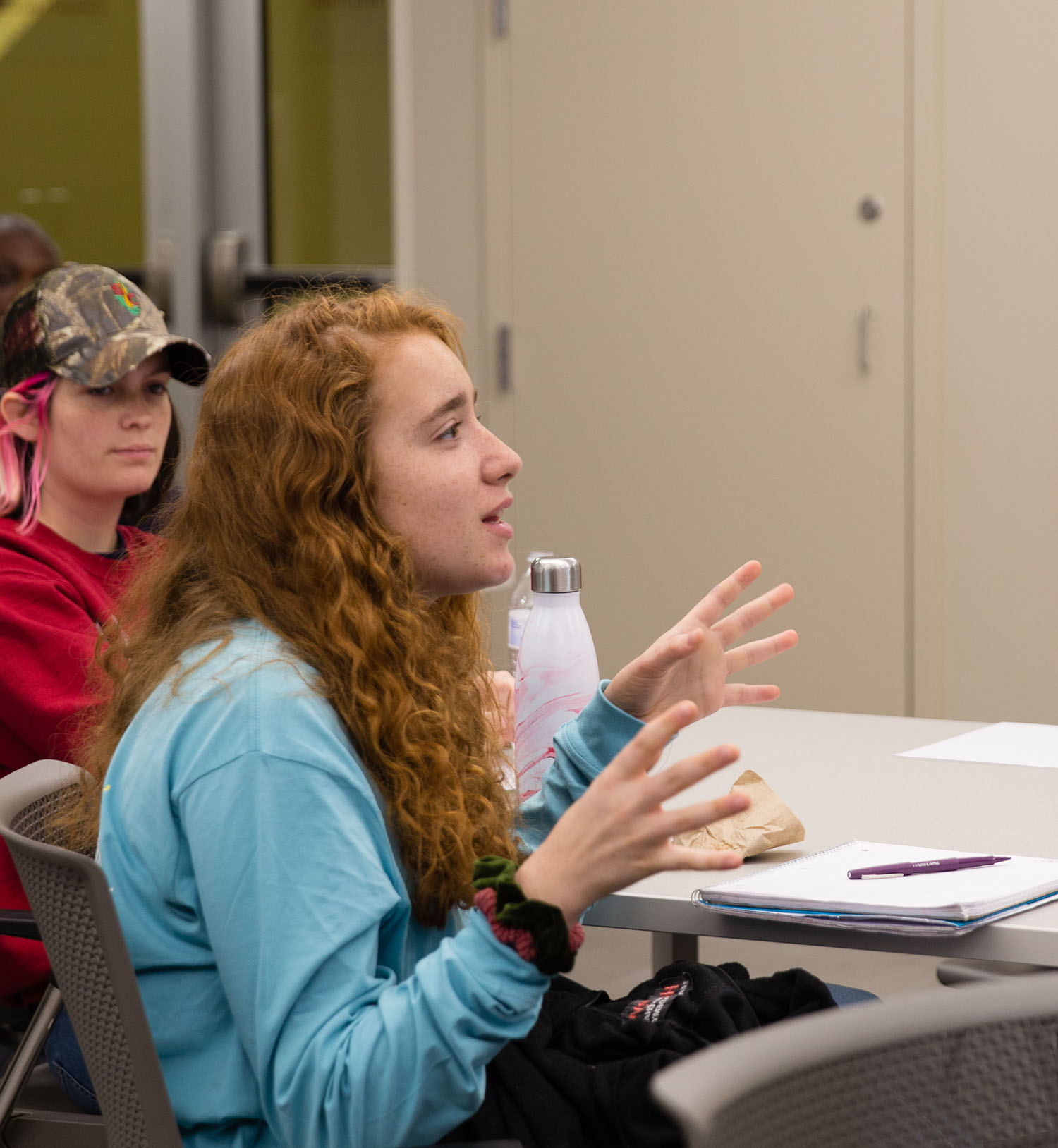 UA students raise questions about community engagement research.