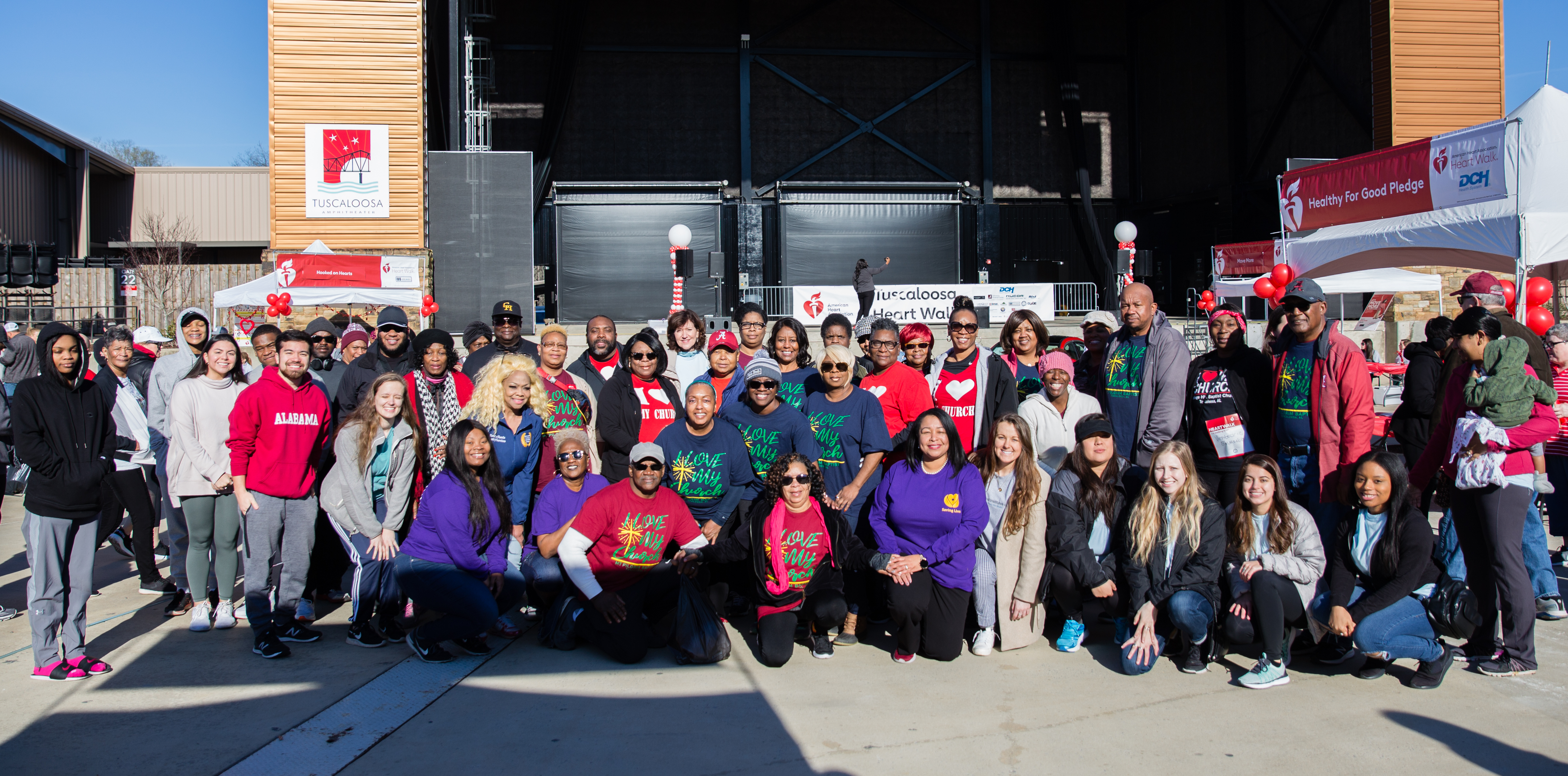Members of the Saving Lives network pose with UA student organizations during the 2020 Tuscaloosa Heart Walk.