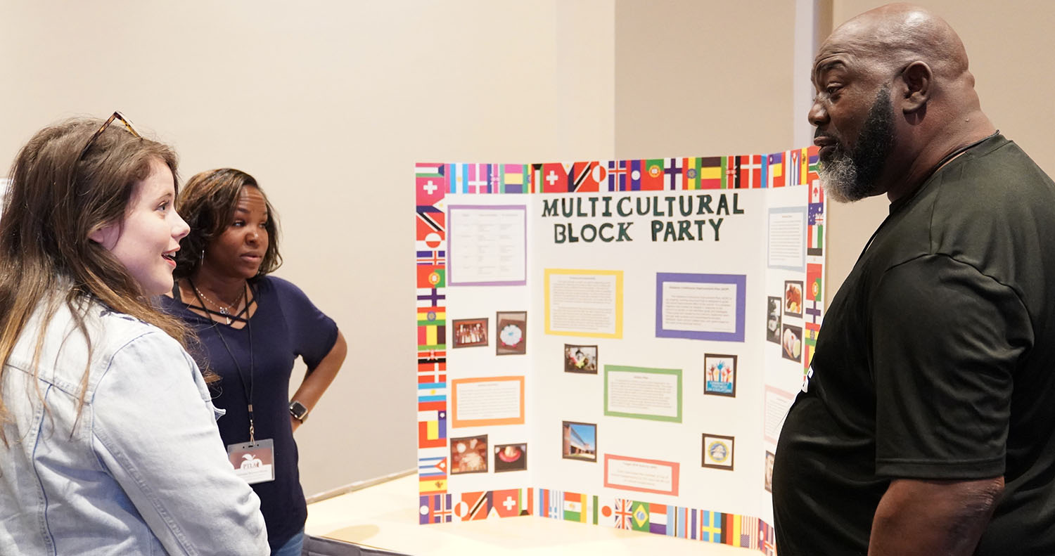 University Place Elementary parents Tasha Nevels and Kenneth Lee introduce their project “Multicultural Block Party.”