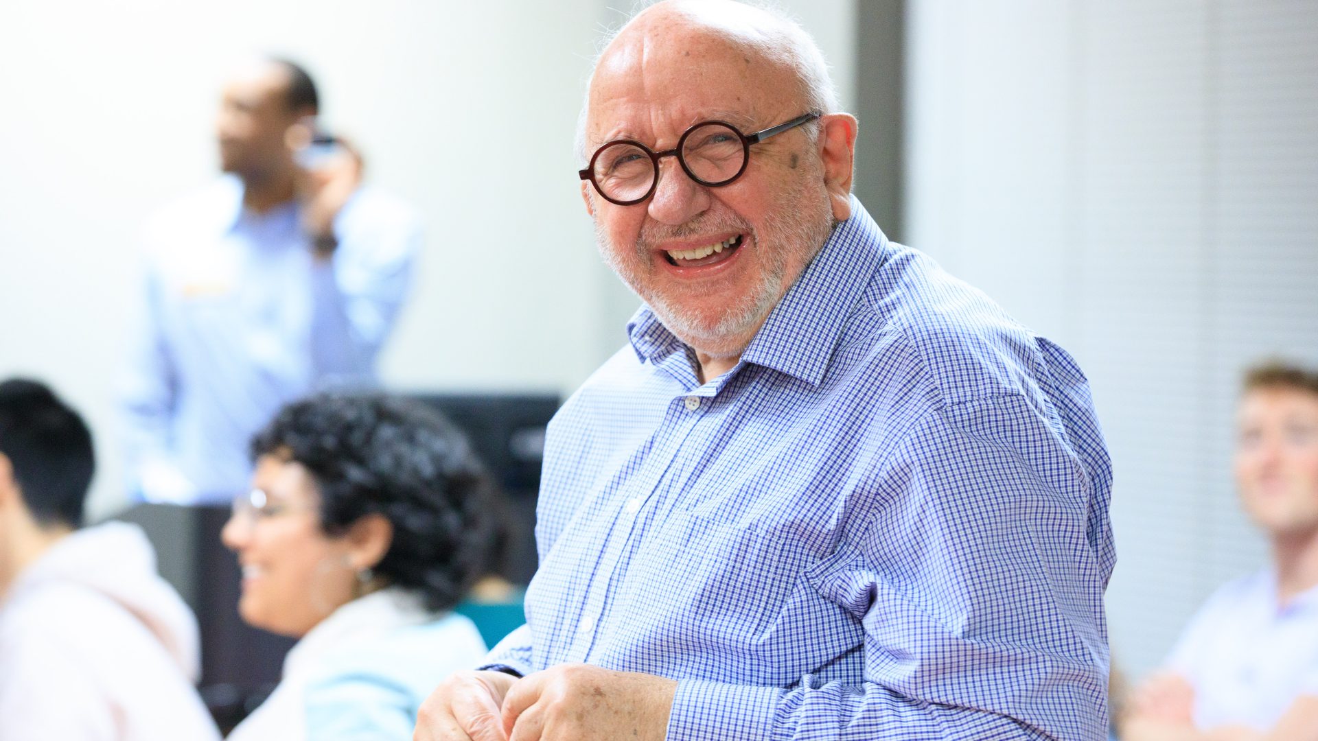 Man in glasses smiling