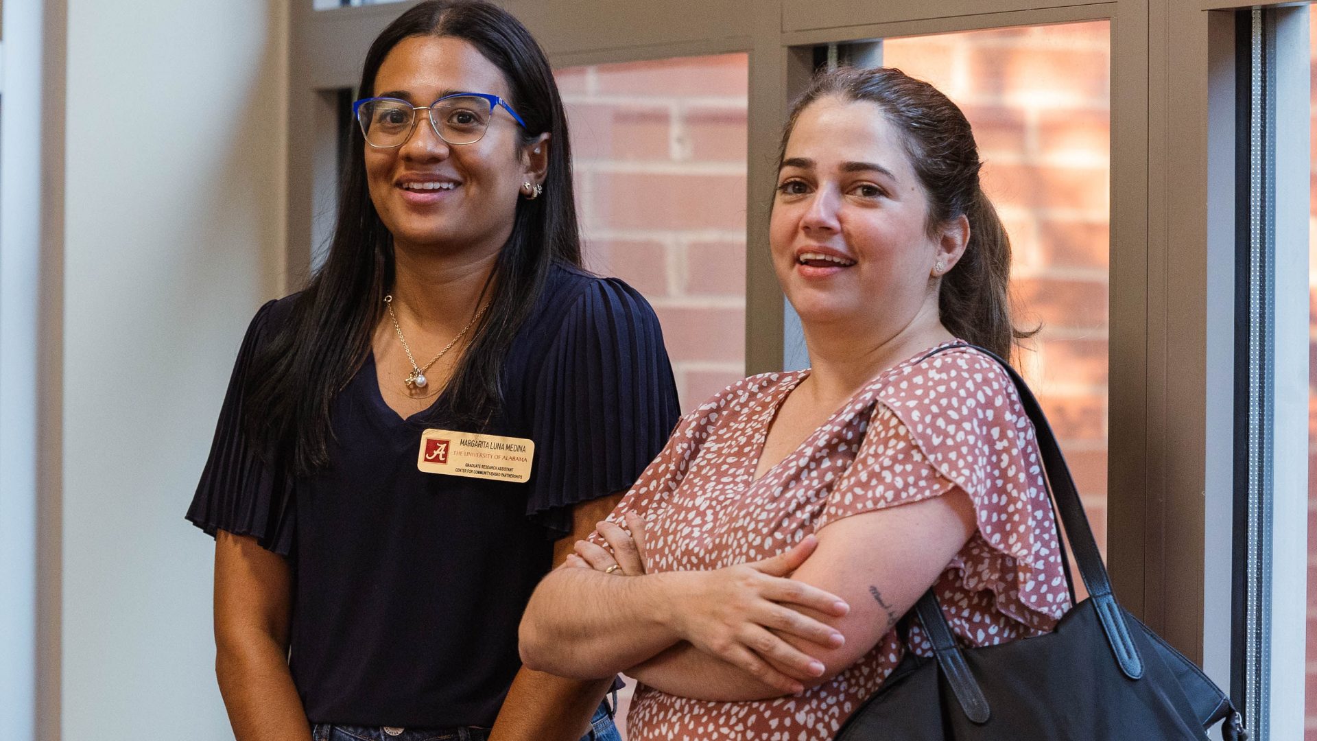 Two students interact at a Global Café event