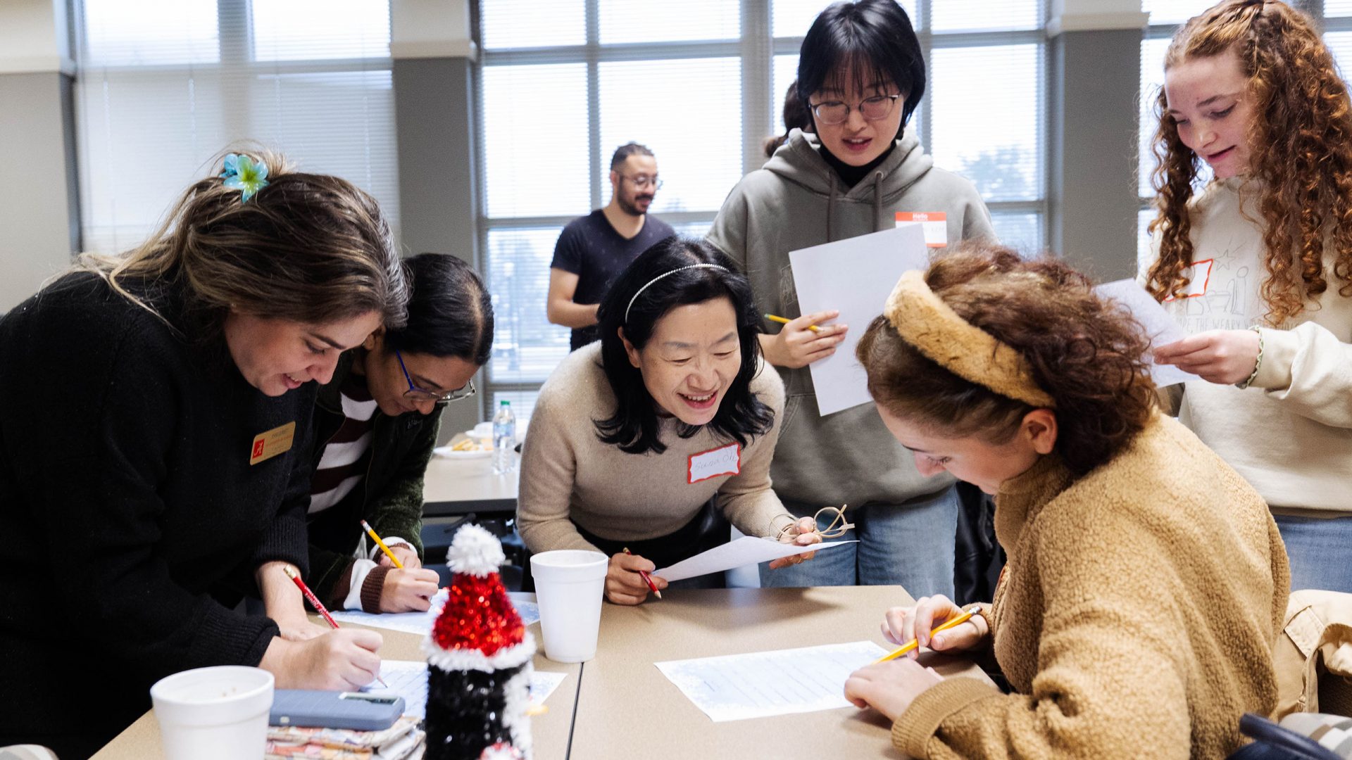 Participants at a Global Café event participate in an icebreaker activity